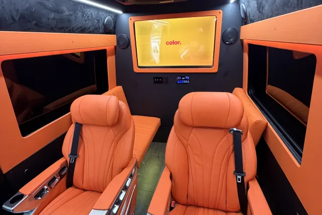 First Class Executive Fleet orange sprinter inside houston