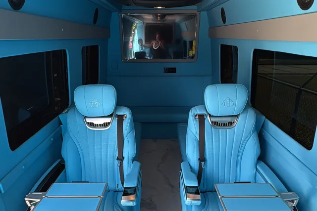 light blue interior sprinter van for events
