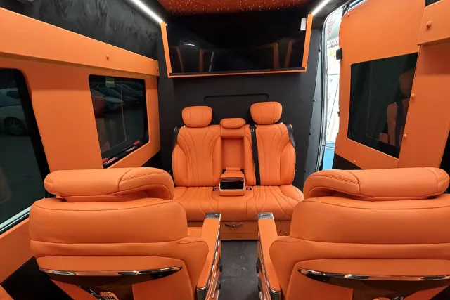 party bus with orange interior inside houston