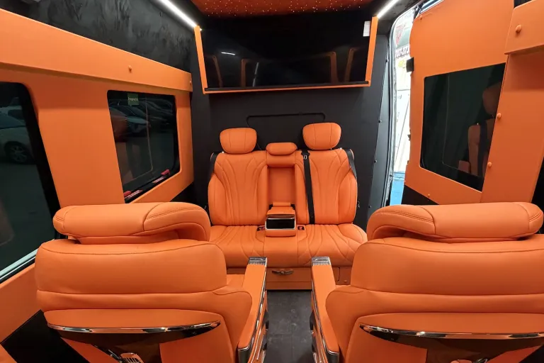 party bus with orange interior inside houston