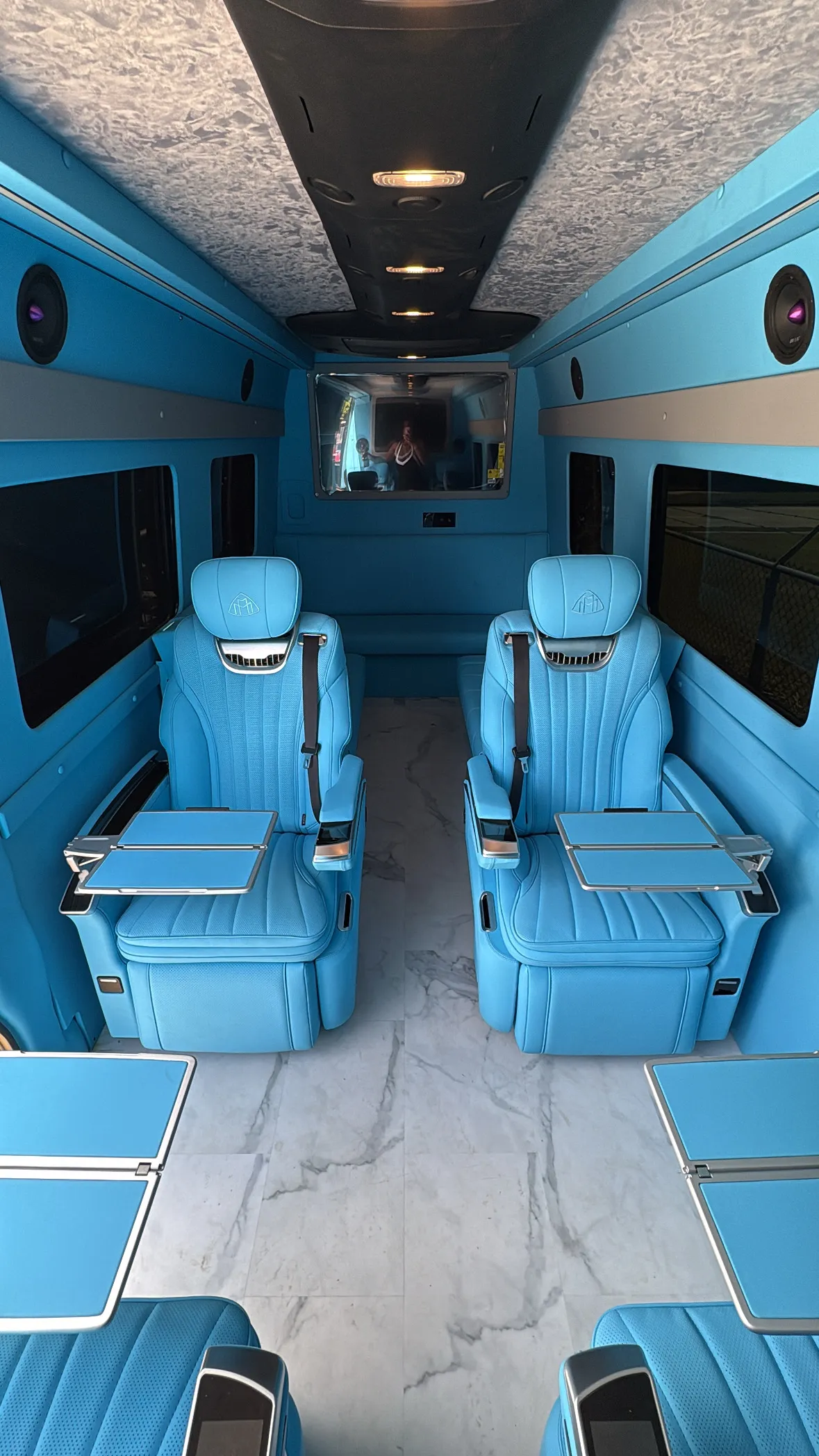 light blue interior sprinter van for events